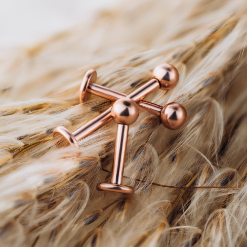 Labret z kulką stalowy - różowe złoto