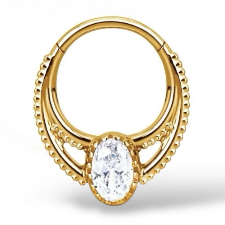 Tytanowy złoty clicker z owalną cyrkonią i zdobieniami