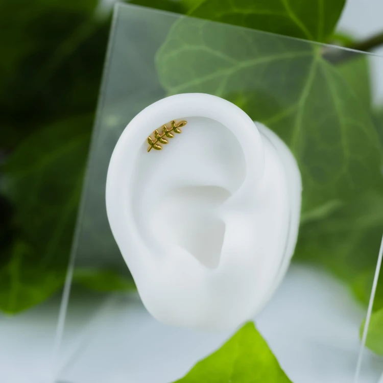 Tytanowy ZŁOTY labret w kształcie gałązki